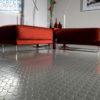 Roll-out polyvinyl commercial flooring